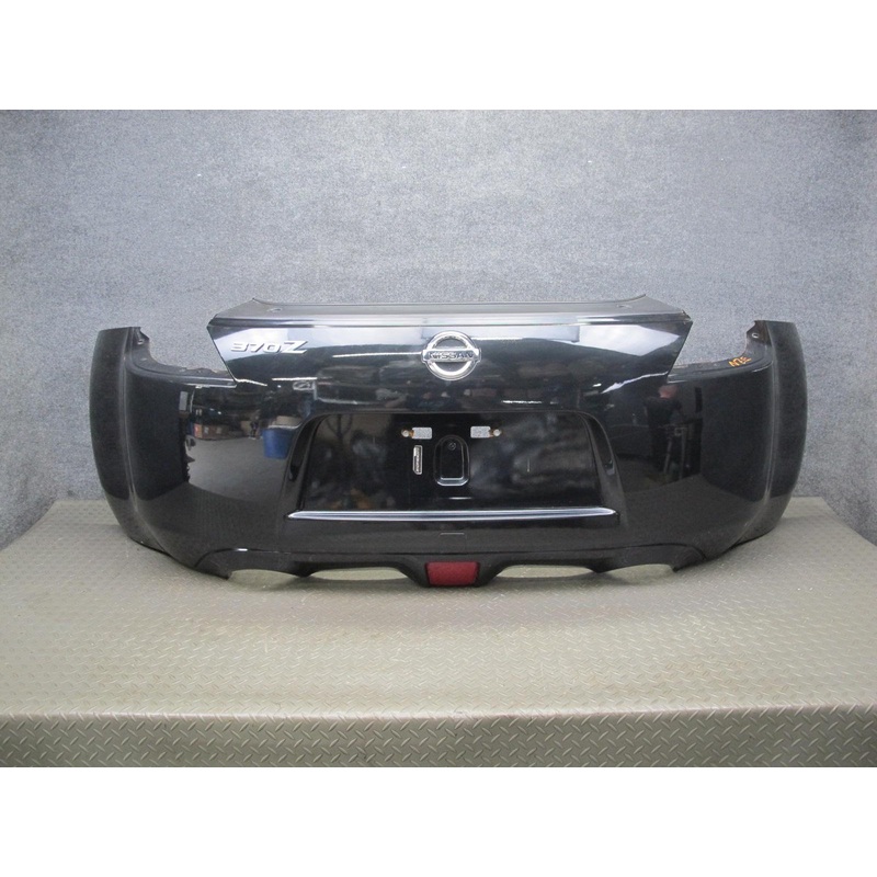 09-20 Nissan Z34 370Z Rear Bumper Cover Panel Black w Emblem OEM